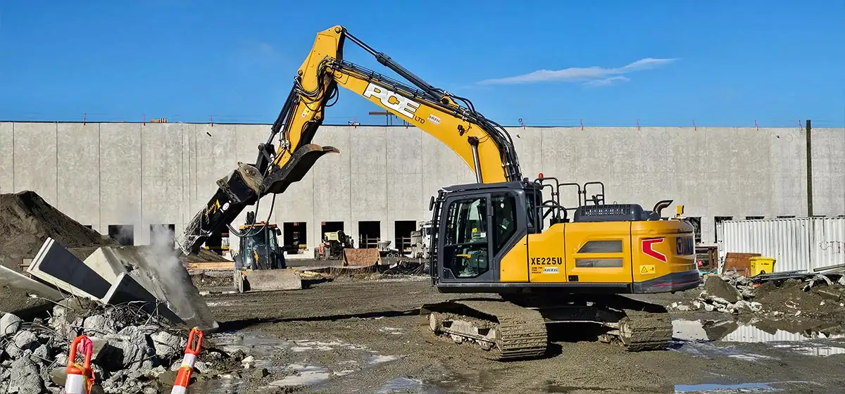 Concrete demolition with a hydraulic attachment