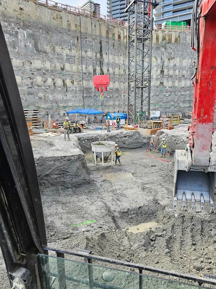 Looking down into the deep excavation