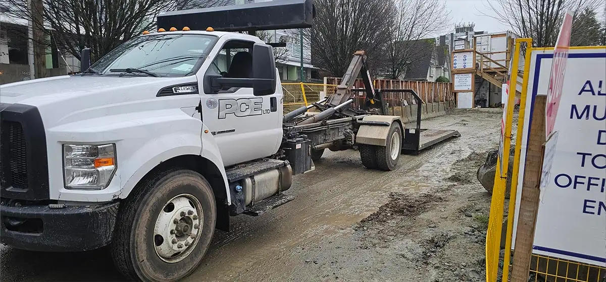 Hotshot truck at the commercial site entrance