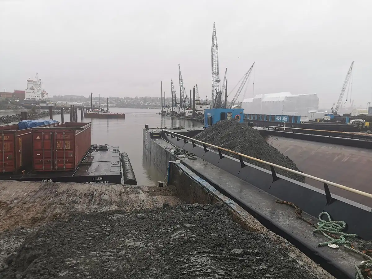 Loaded barge alongside the dock