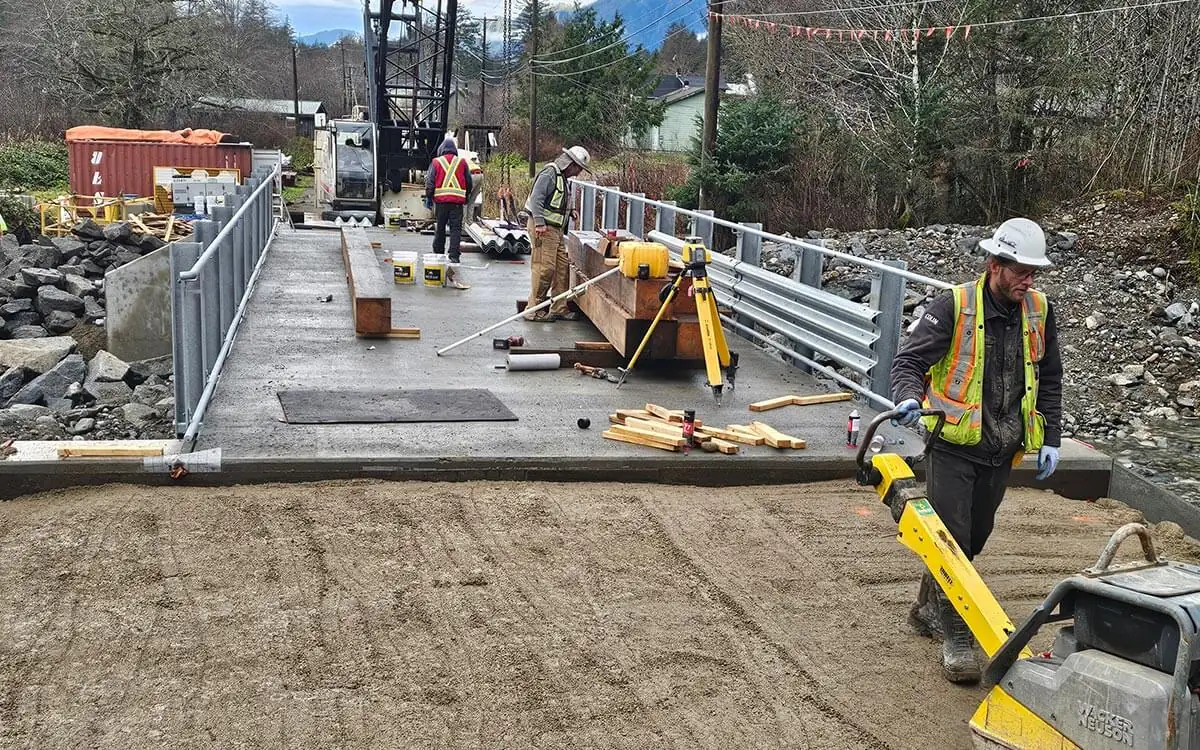 Crew finishing the deck of the new bridge